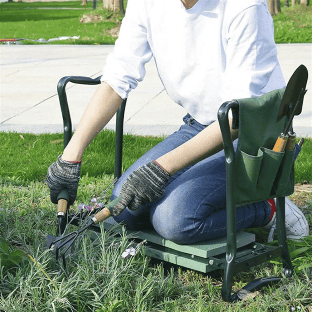 Person using a garden kneeler with gardening tools in a grassy area