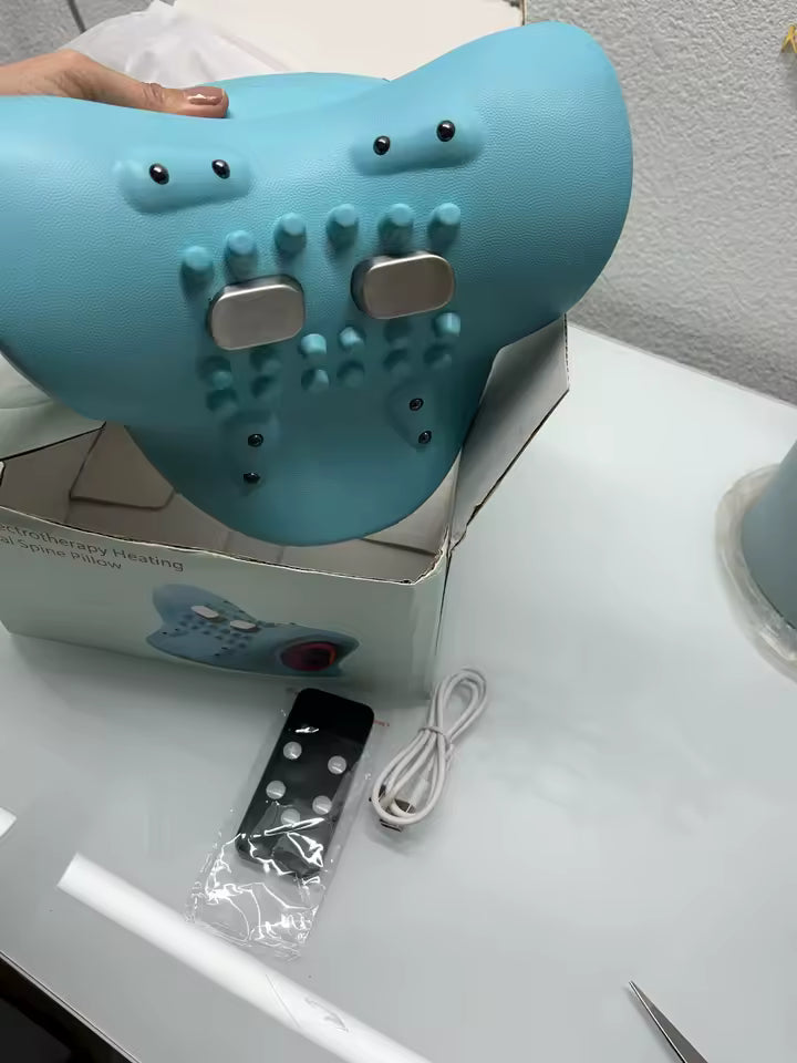 Blue shark-shaped device with buttons on a white surface next to its packaging.
